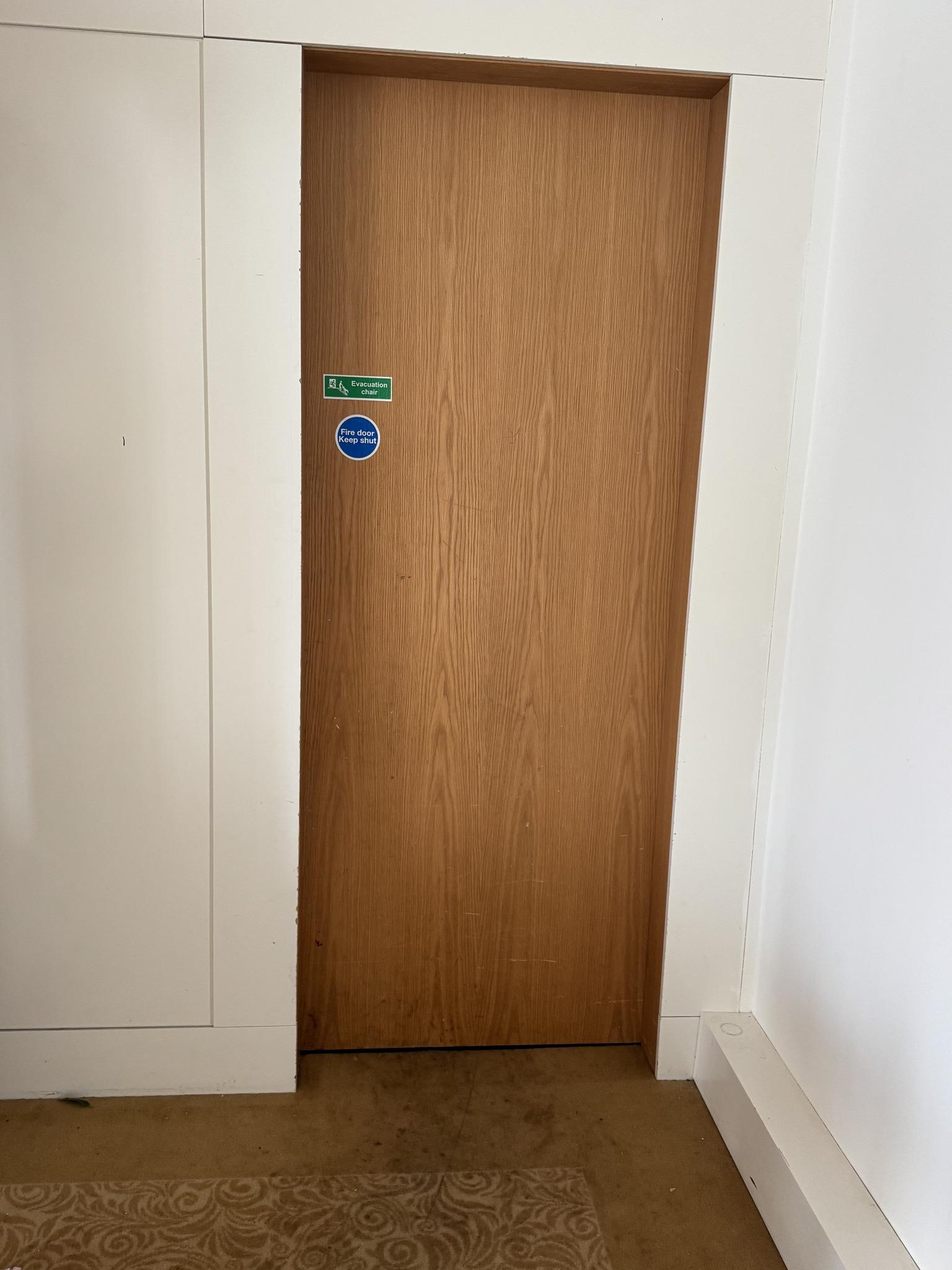 Fire door inspected at Meridian Grand during the fire risk assessment